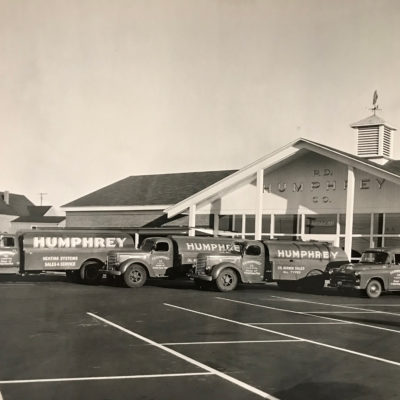 1957 (Location #2- Main Rd) Showing truck fleet