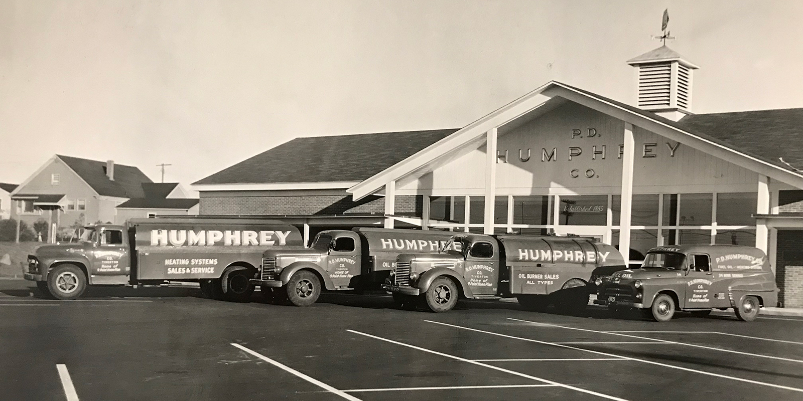 1957 (Location #2- Main Rd) Showing truck fleet