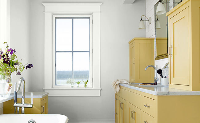 Benjamin Moore bathroom with yellow cabinets